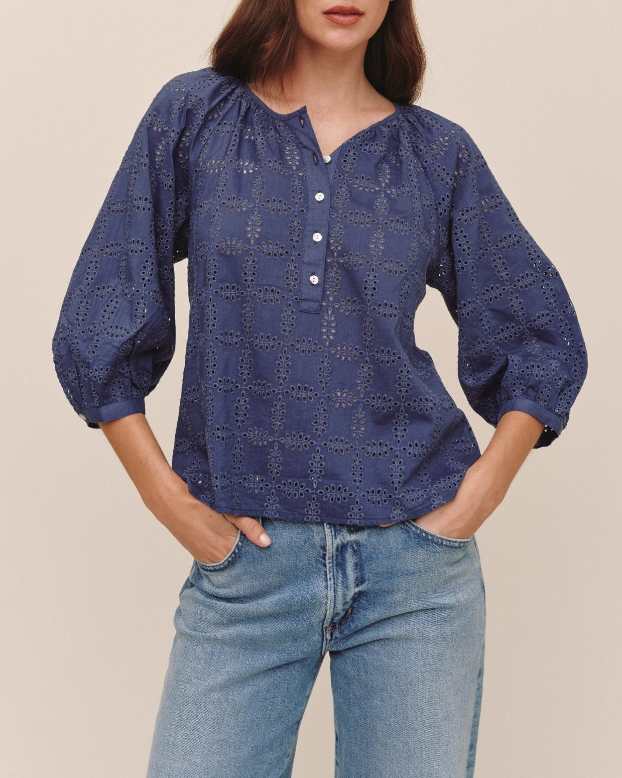 Bella Dahl indigo blue eyelet 3/4 sleeve pullover blouse paired with light wash jeans