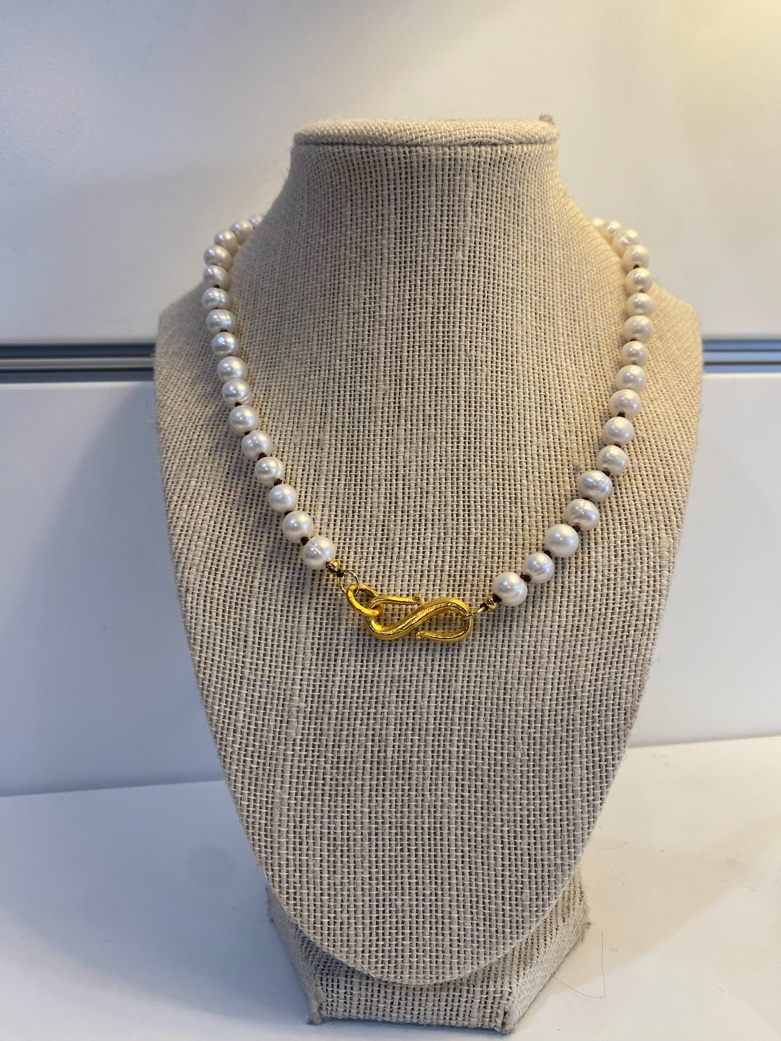 Hand knotted freshwater pearl necklace with S clasp