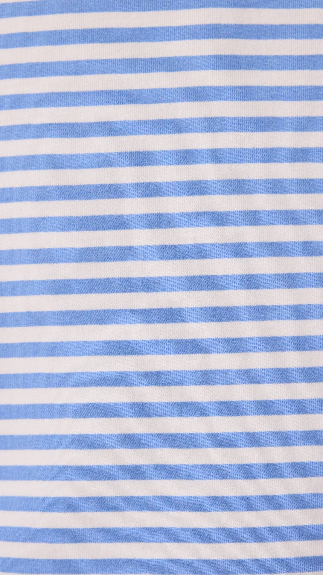 Close-up of blue and white horizontal striped Pima knit fabric for pajamas