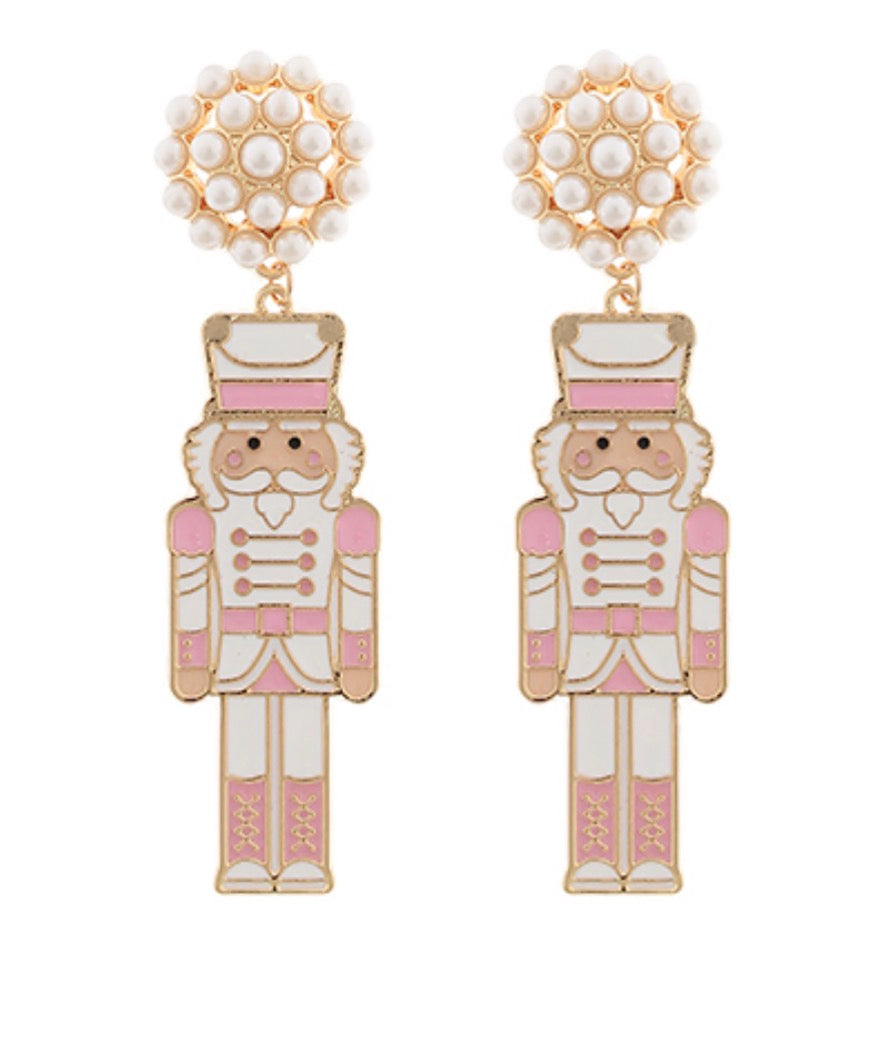 Enamel Coated Metal Nutcracker Earrings | Light Pink & White