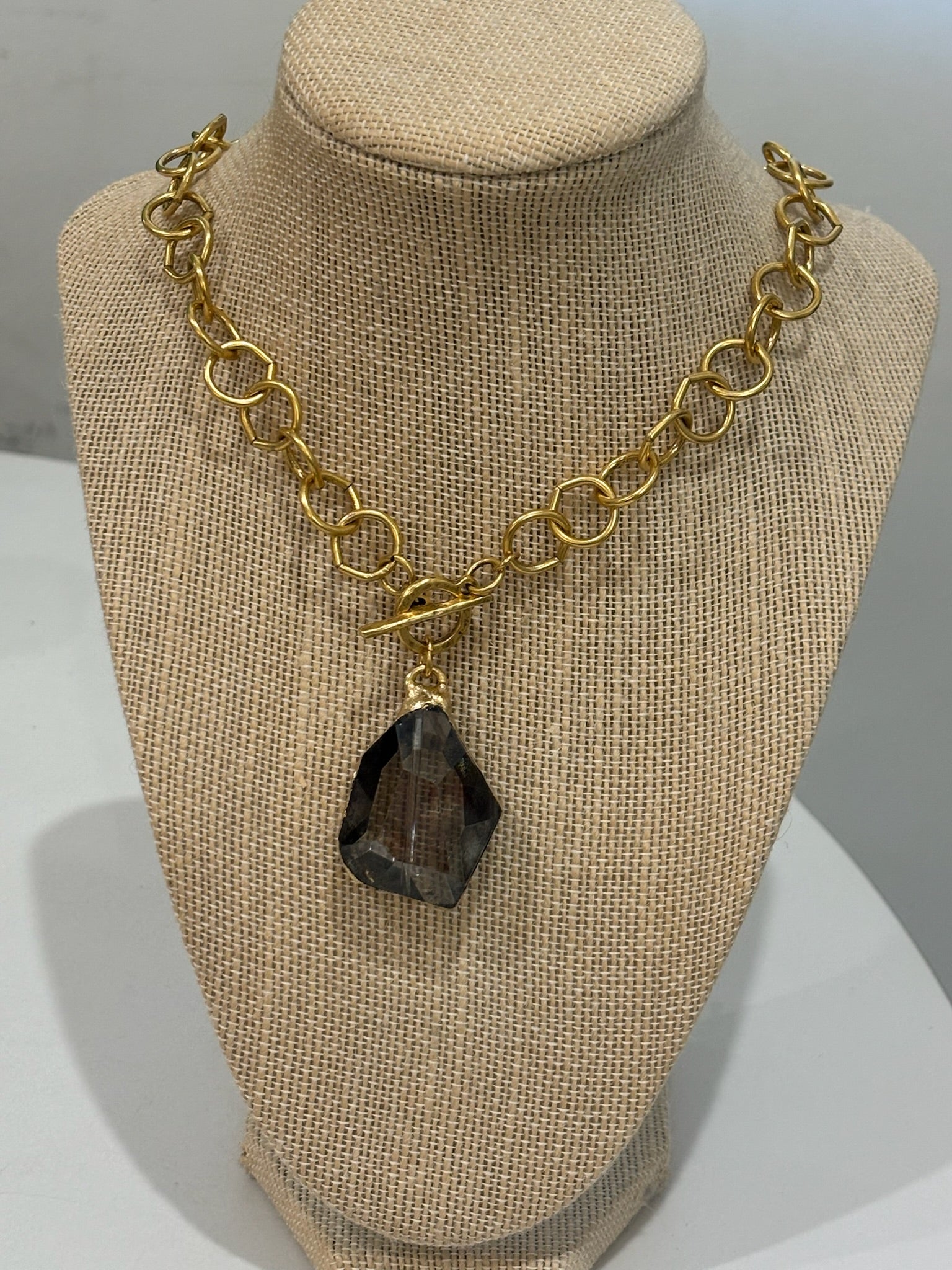Grey Stone Pendant on Gold Chain
