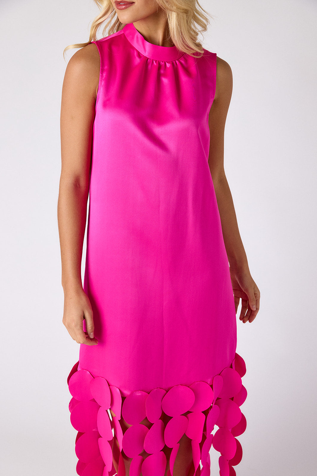 Crosby by Mollie Burch Ponce Party Dress in Mollie Pink with circular appliqué hem detail