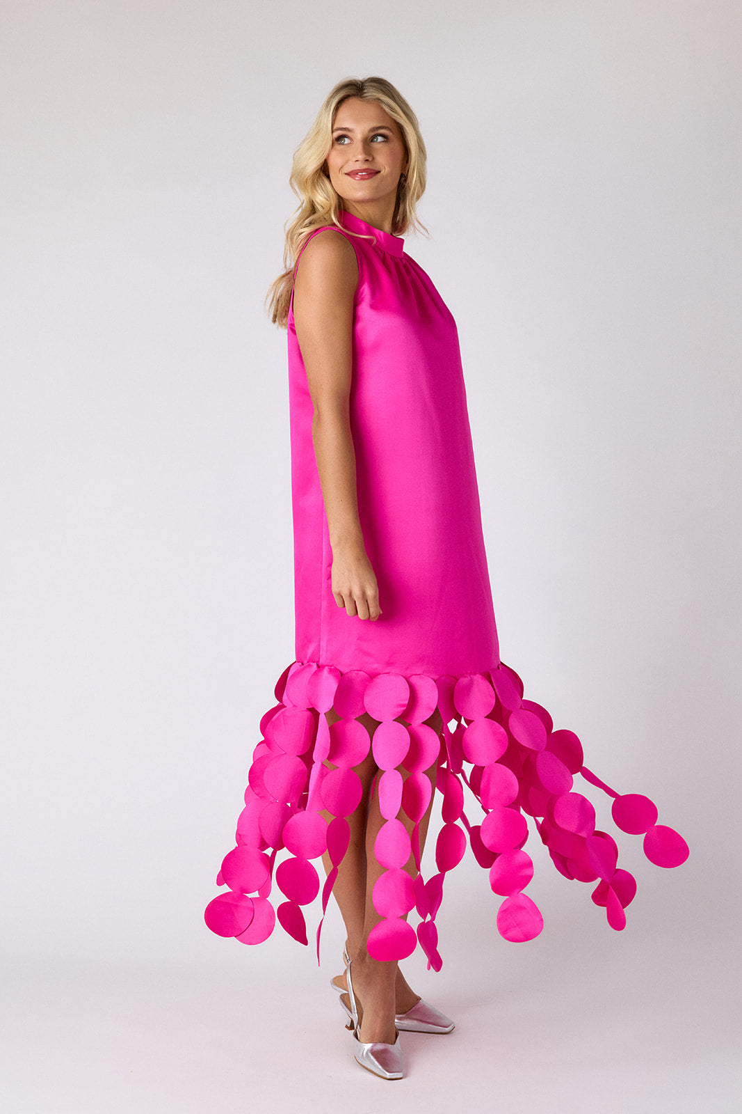 Crosby by Mollie Burch Ponce Party Dress in vibrant hot pink with circular bubble hem embellishments