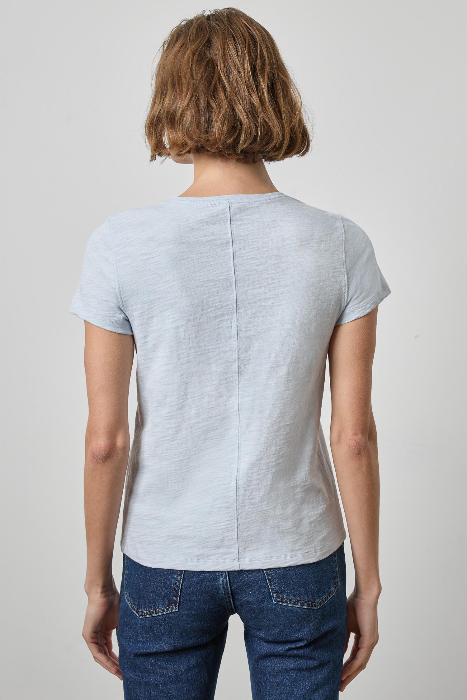 Lilla P Tie Front Tee in Glacier, back view, light blue short sleeve shirt with center seam detail