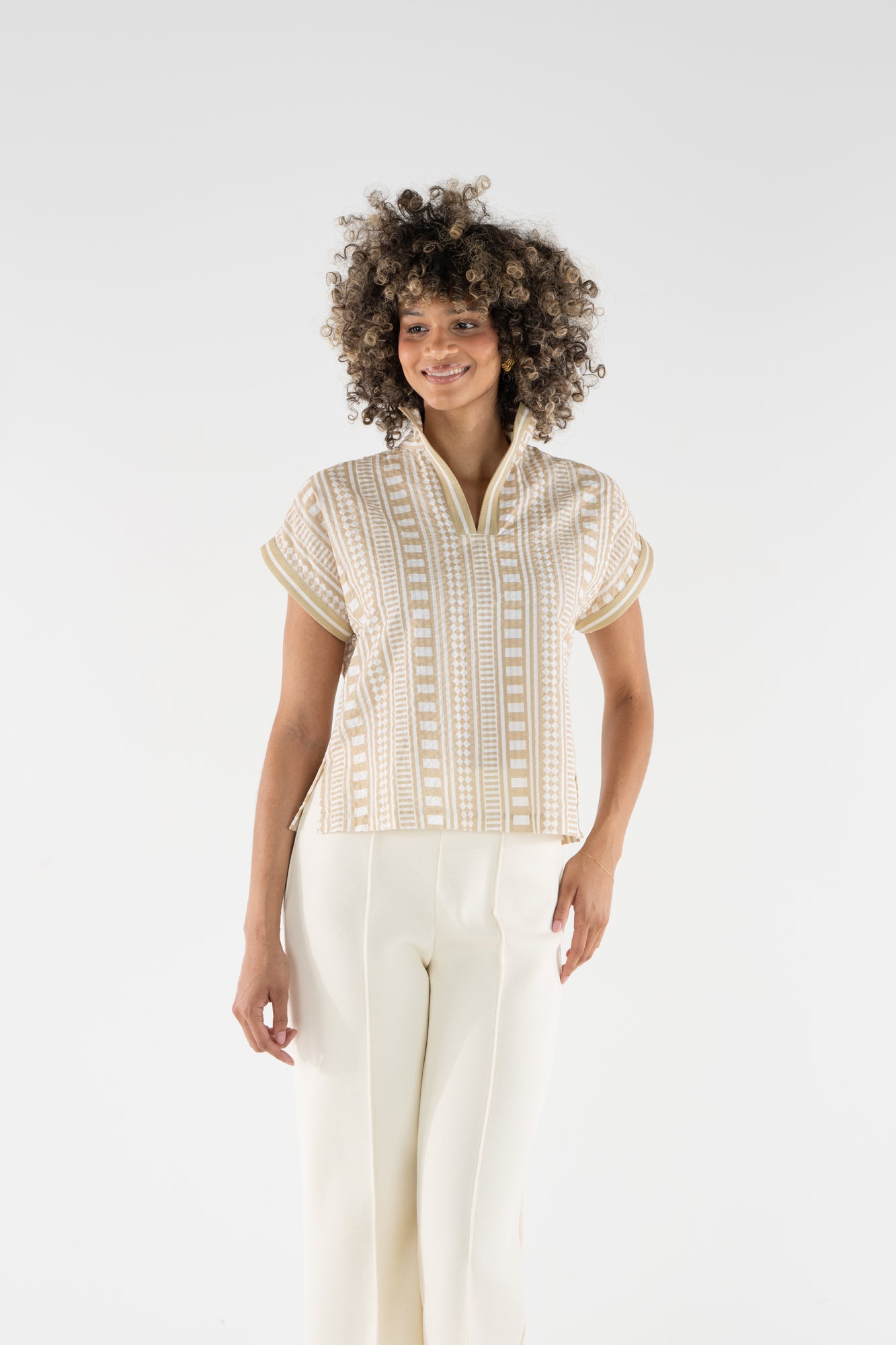 Emily McCarthy Riviera Top in white with tan geometric stripe pattern and V-neckline