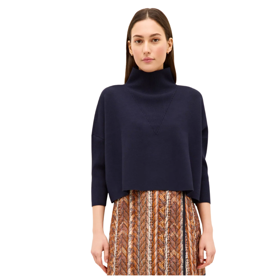 Marie Oliver Claudie Popover in iris navy blue with turtleneck and cropped silhouette