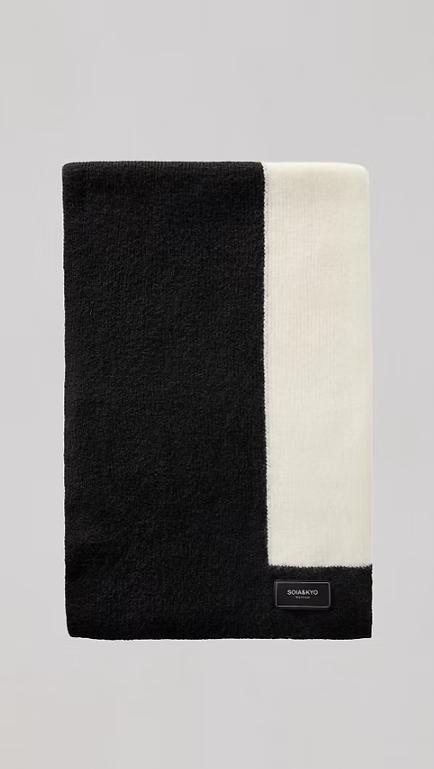 Soia & Kyo Delani scarf in black and cream colorblock design on gray background