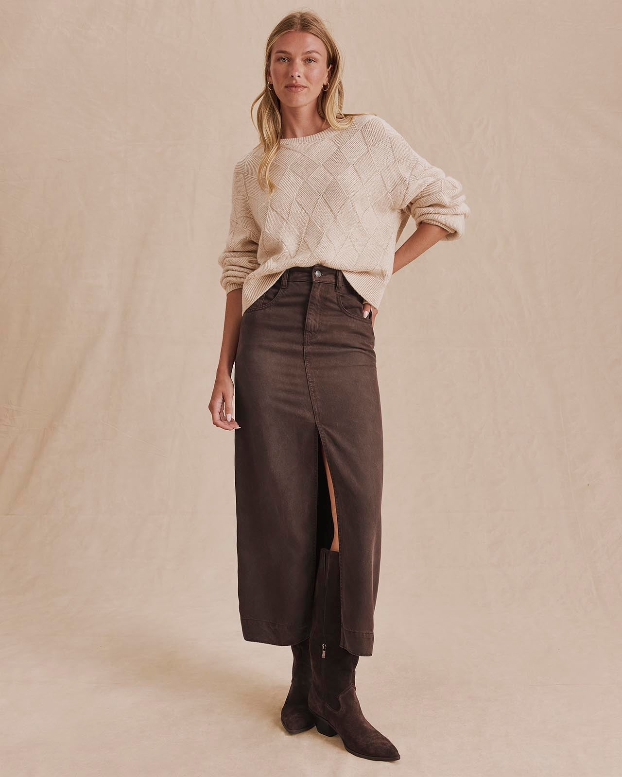 Splendid Ryder Suede Midi Skirt in Java brown with front slit, styled with cream sweater and brown boots