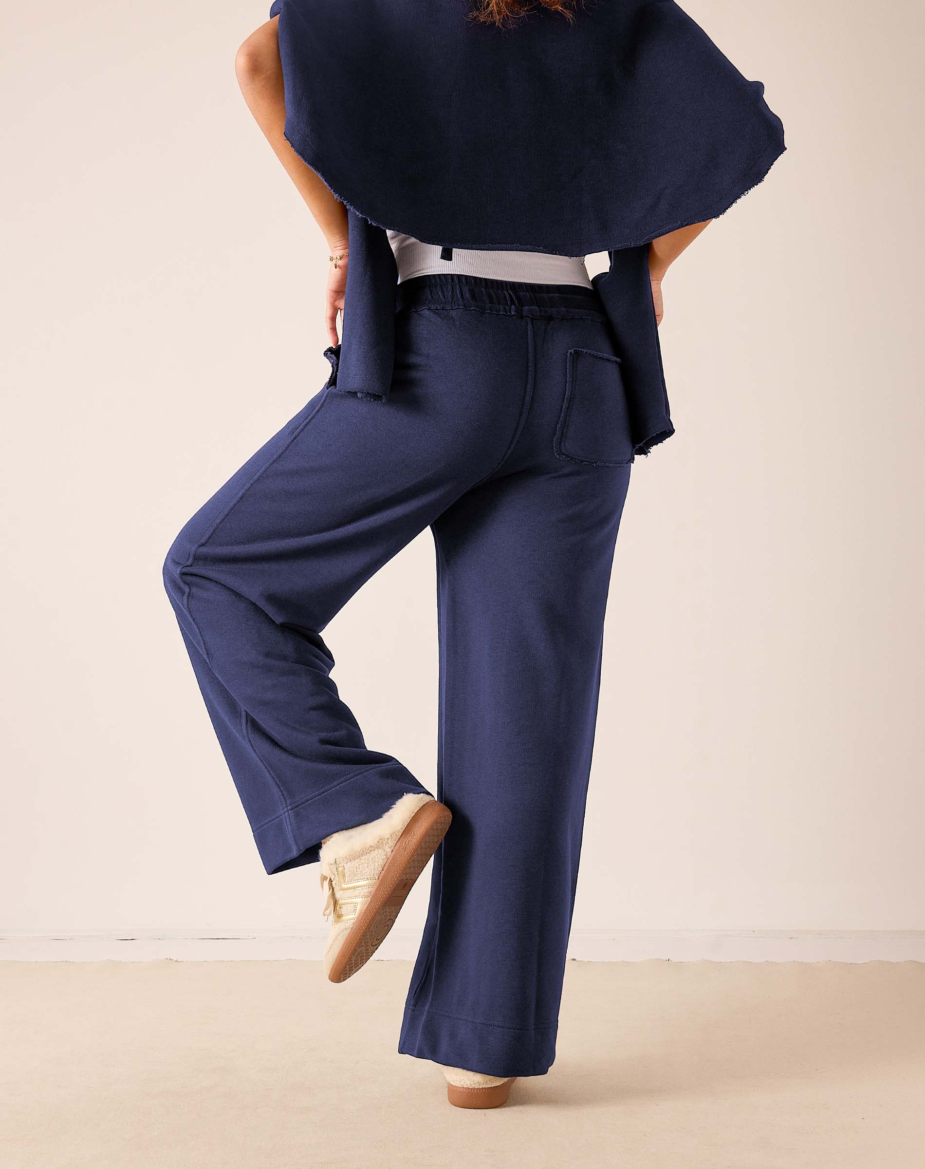 Mer-Sea Frenchie Wide Leg Pant in Cadet Blue shown from back with sneakers