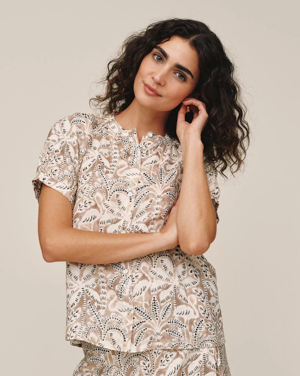 Bella Dahl short sleeve button-front shirt in beige tropical palm print on model